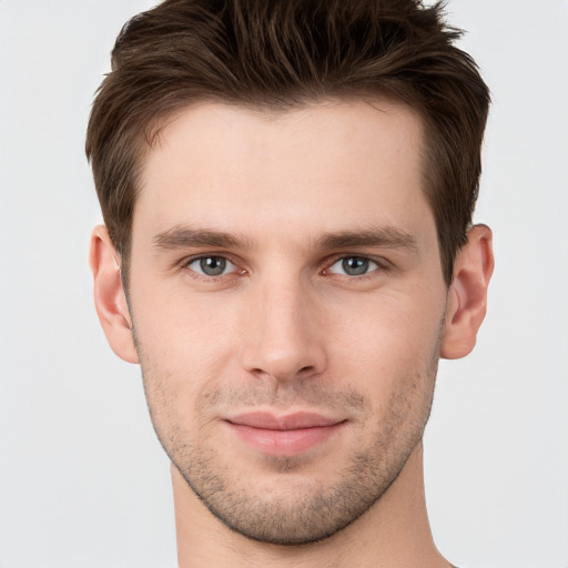 Neutral white young-adult male with short  brown hair and brown eyes