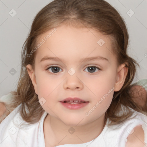 Joyful white child female with medium  brown hair and brown eyes