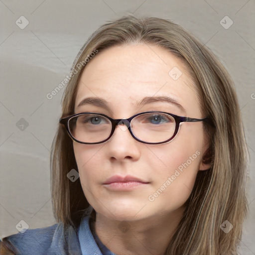 Neutral white young-adult female with long  brown hair and blue eyes