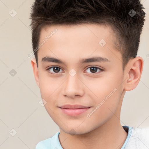 Joyful white child male with short  brown hair and brown eyes