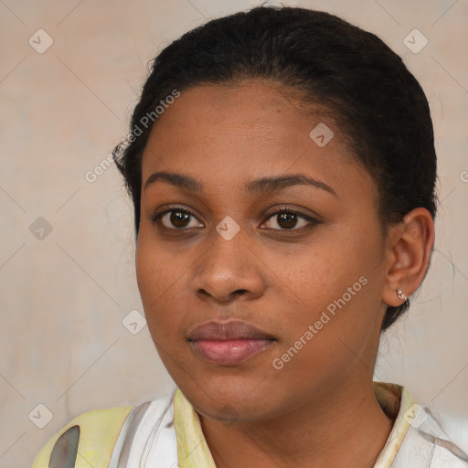 Neutral black young-adult female with short  brown hair and brown eyes