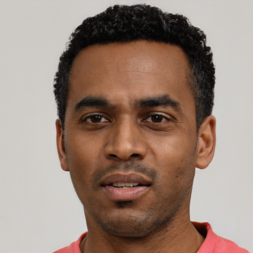 Neutral black young-adult male with short  black hair and brown eyes