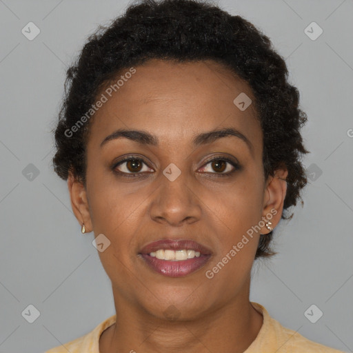 Joyful black young-adult female with short  brown hair and brown eyes