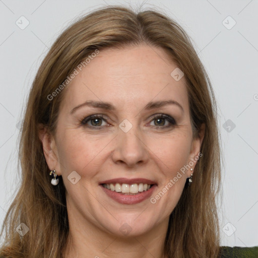 Joyful white adult female with medium  brown hair and grey eyes