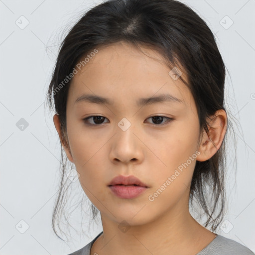 Neutral asian young-adult female with medium  brown hair and brown eyes