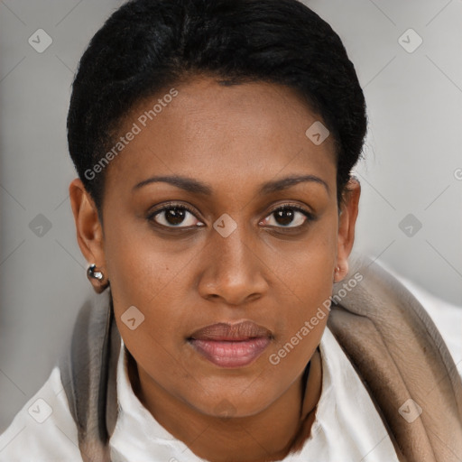Joyful black young-adult female with short  brown hair and brown eyes