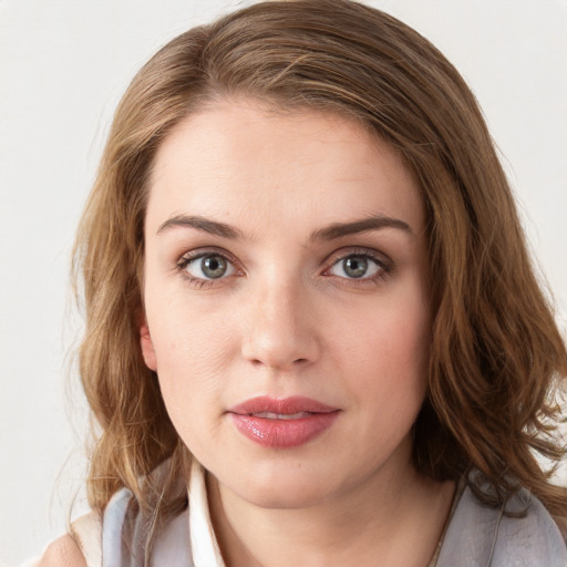 Neutral white young-adult female with medium  brown hair and blue eyes