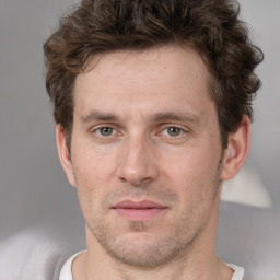 Neutral white adult male with short  brown hair and brown eyes