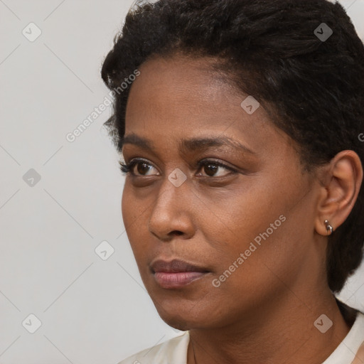 Neutral black young-adult female with short  black hair and brown eyes