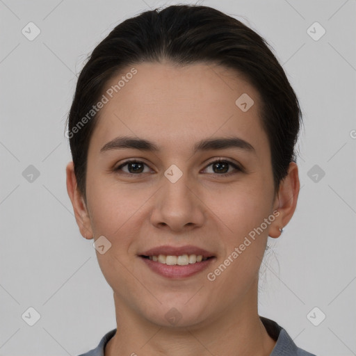 Joyful white young-adult female with short  brown hair and brown eyes