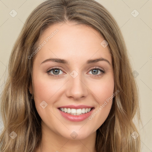 Joyful white young-adult female with long  brown hair and green eyes