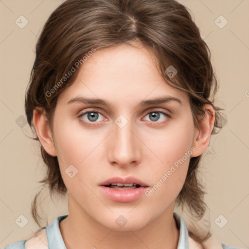 Neutral white young-adult female with medium  brown hair and grey eyes