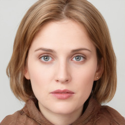Neutral white young-adult female with medium  brown hair and grey eyes