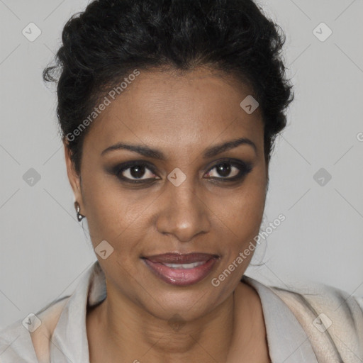 Joyful black young-adult female with short  brown hair and brown eyes