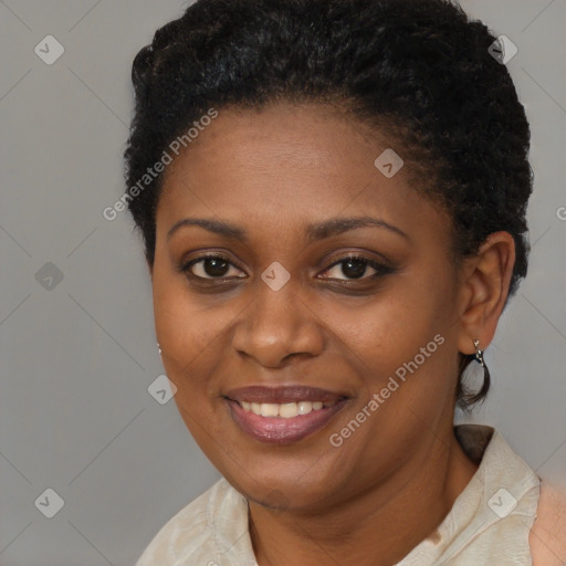 Joyful black young-adult female with short  brown hair and brown eyes