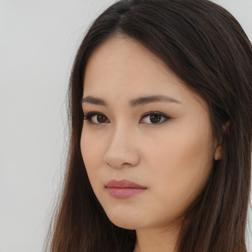 Neutral asian young-adult female with long  brown hair and brown eyes
