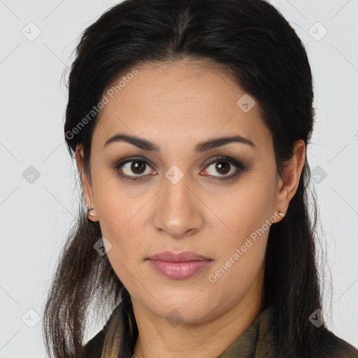 Joyful latino young-adult female with long  brown hair and brown eyes