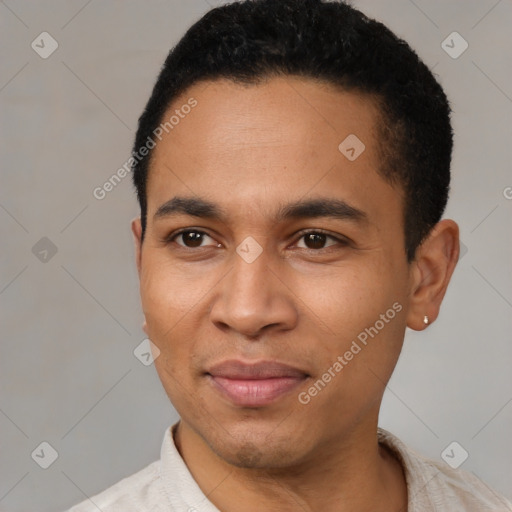 Joyful latino young-adult male with short  black hair and brown eyes