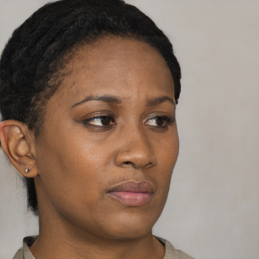 Neutral black young-adult female with short  brown hair and brown eyes