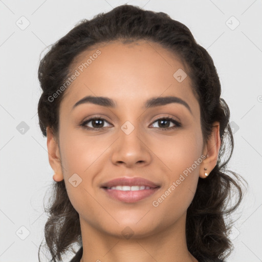 Joyful latino young-adult female with long  brown hair and brown eyes