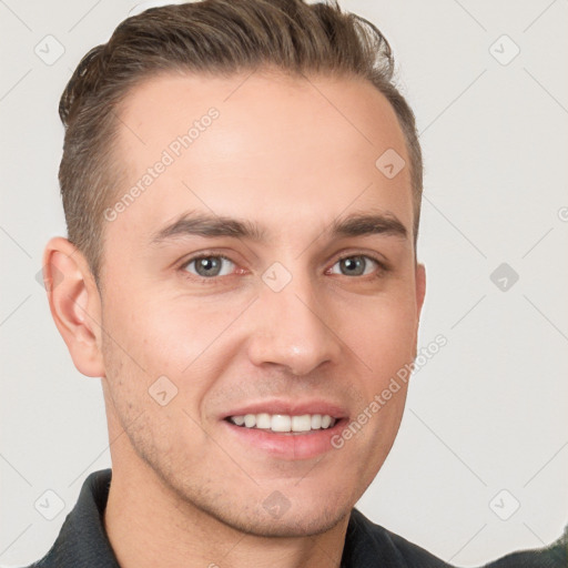 Joyful white young-adult male with short  brown hair and brown eyes