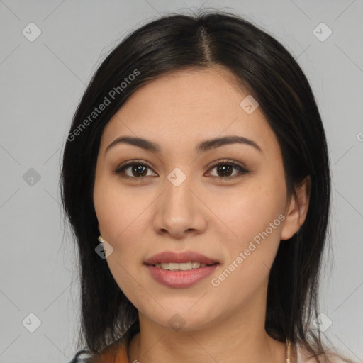 Joyful asian young-adult female with medium  black hair and brown eyes