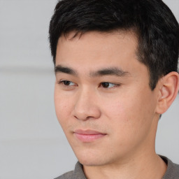 Neutral white young-adult male with short  black hair and brown eyes