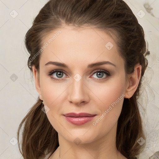 Joyful white young-adult female with medium  brown hair and green eyes