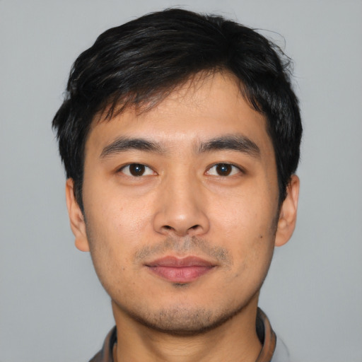 Neutral asian young-adult male with short  black hair and brown eyes