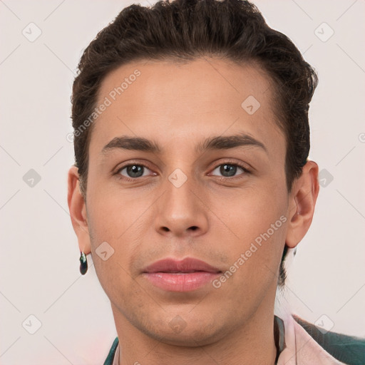 Joyful white young-adult male with short  brown hair and brown eyes