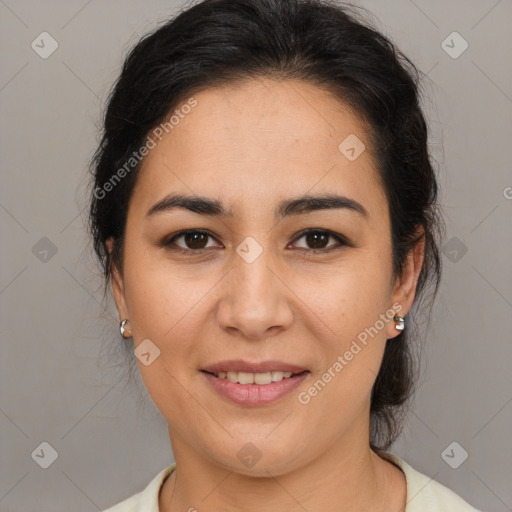 Joyful latino young-adult female with medium  brown hair and brown eyes