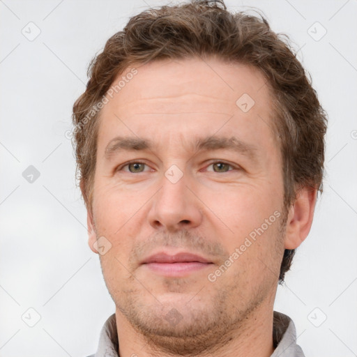 Neutral white adult male with short  brown hair and brown eyes