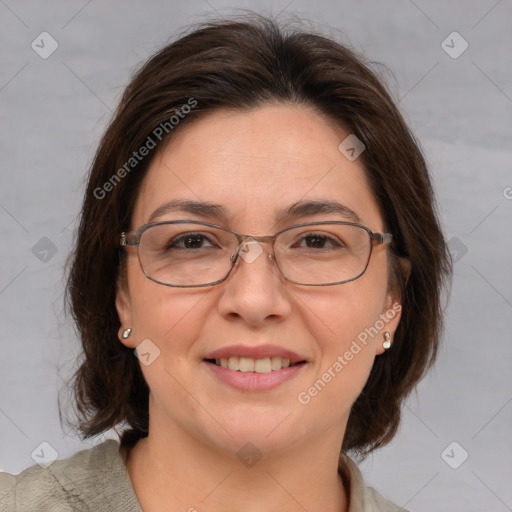 Joyful white adult female with medium  brown hair and brown eyes