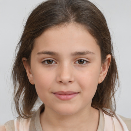 Joyful white child female with medium  brown hair and brown eyes