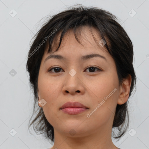 Joyful asian young-adult female with medium  brown hair and brown eyes