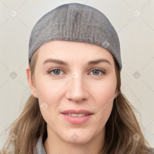 Joyful white young-adult female with long  brown hair and grey eyes