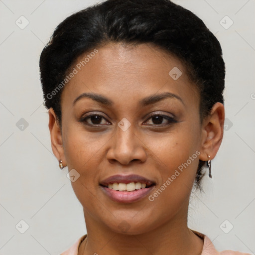 Joyful black young-adult female with short  brown hair and brown eyes