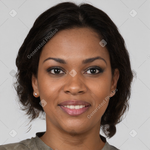 Joyful black young-adult female with medium  brown hair and brown eyes