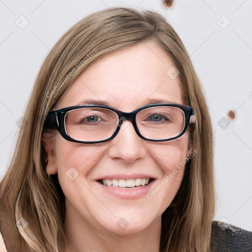 Joyful white young-adult female with medium  brown hair and blue eyes