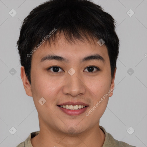 Joyful asian young-adult male with short  brown hair and brown eyes