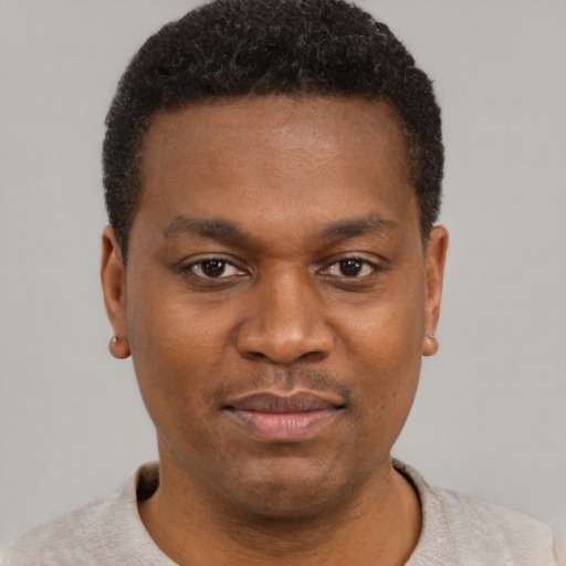 Neutral black young-adult male with short  brown hair and brown eyes