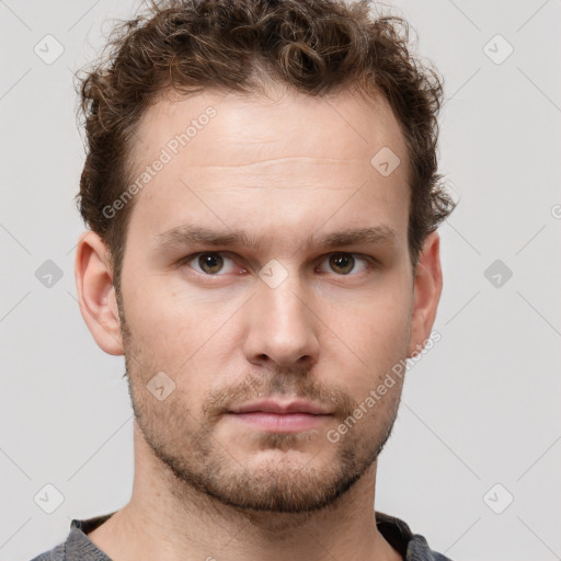 Neutral white young-adult male with short  brown hair and grey eyes