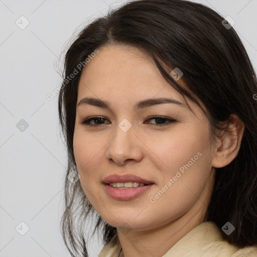 Joyful asian young-adult female with long  brown hair and brown eyes