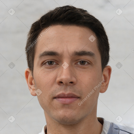 Neutral white young-adult male with short  brown hair and brown eyes