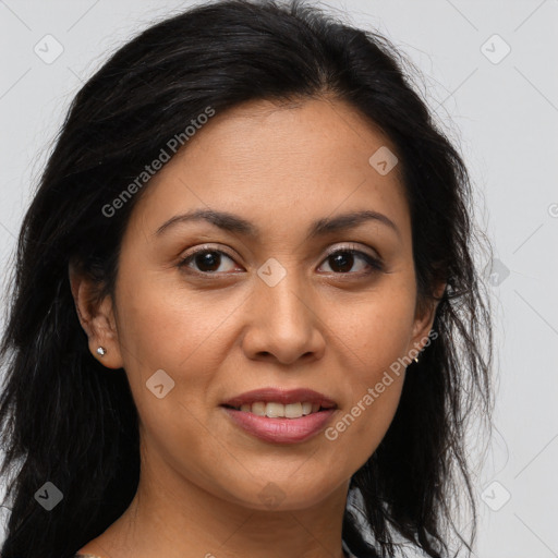 Joyful latino young-adult female with long  brown hair and brown eyes