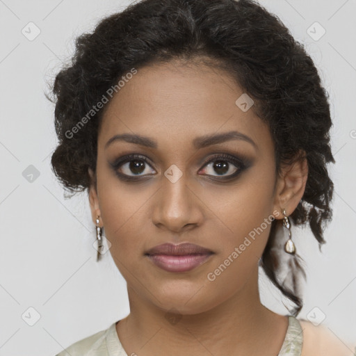 Joyful black young-adult female with long  brown hair and brown eyes