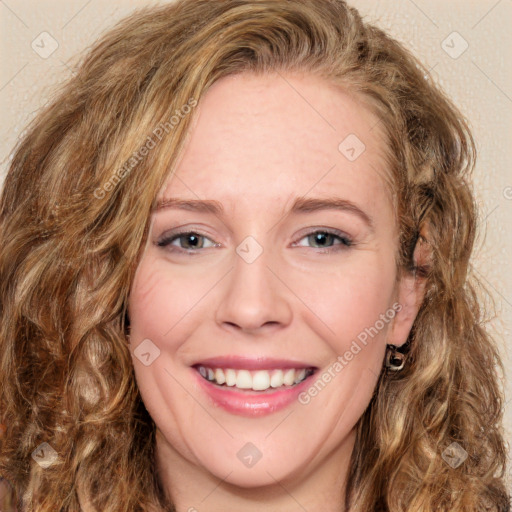 Joyful white young-adult female with long  brown hair and green eyes