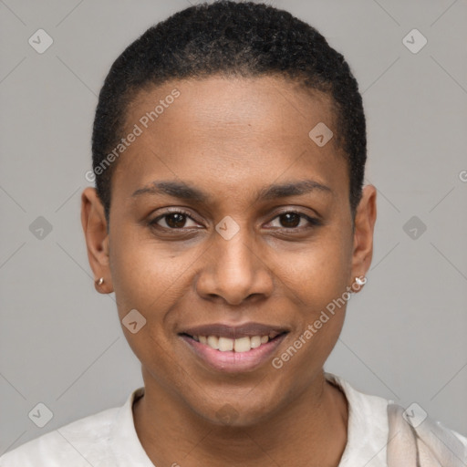 Joyful black young-adult female with short  brown hair and brown eyes