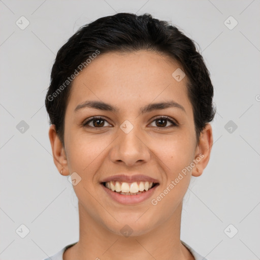 Joyful latino young-adult female with short  brown hair and brown eyes