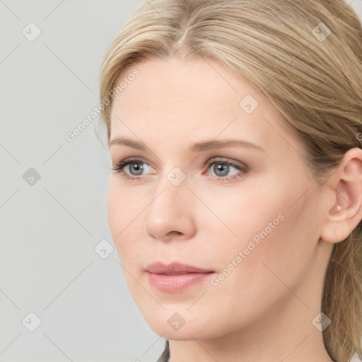 Neutral white young-adult female with long  brown hair and grey eyes